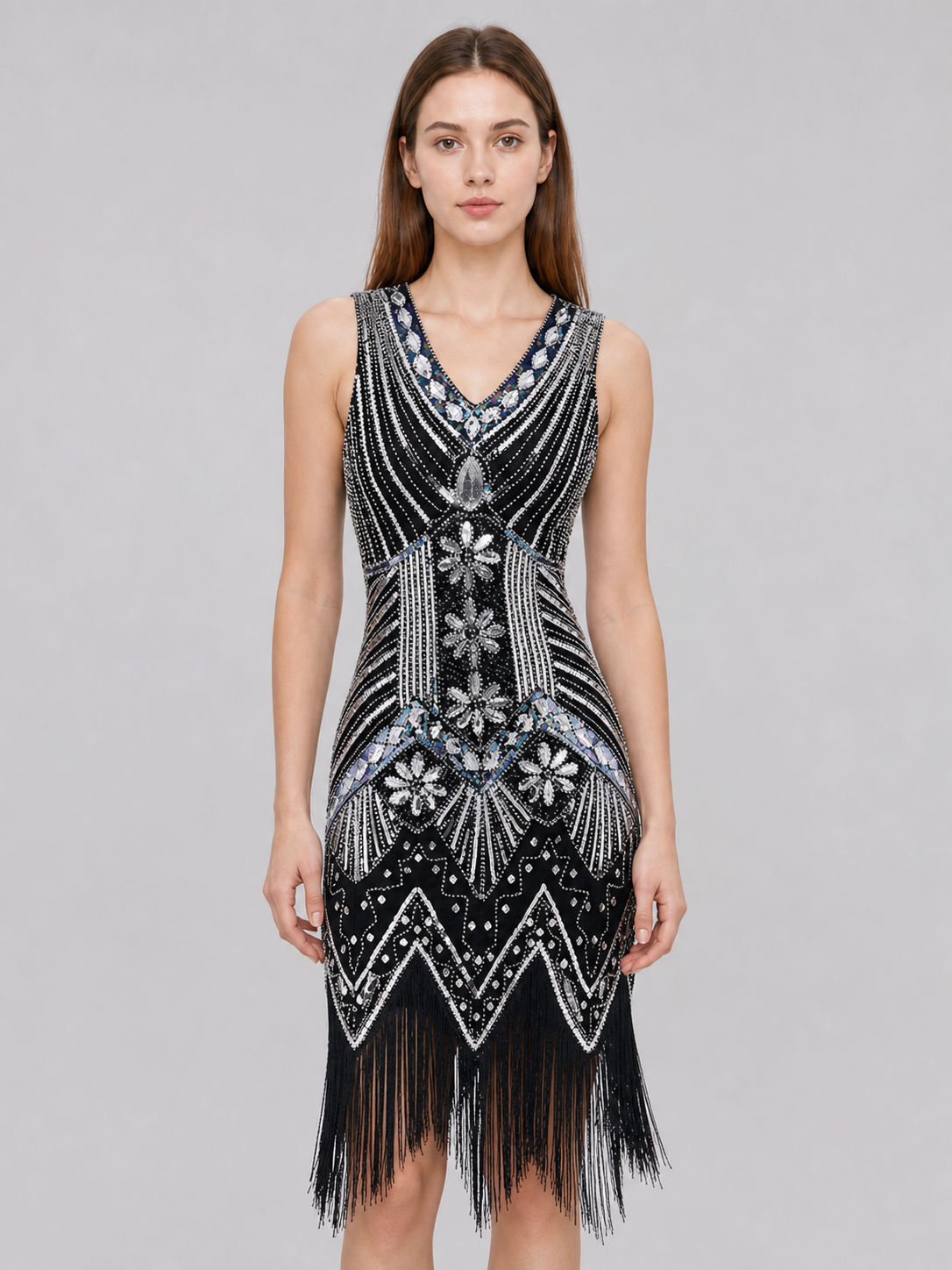 Sleeveless dress with a V-neckline and a fitted silhouette, made from fabric