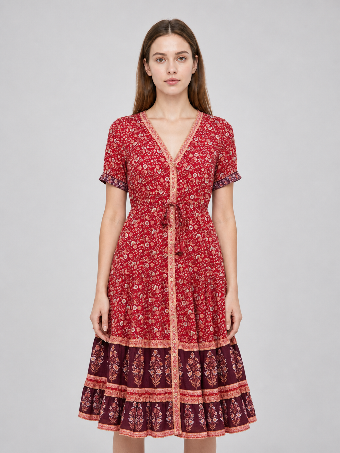 Midi dress with a floral print and tiered skirt