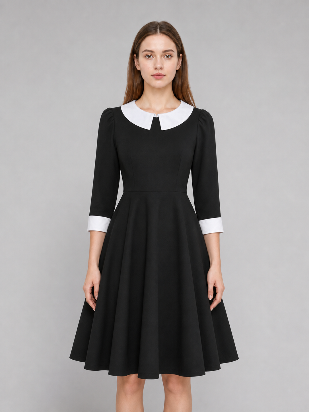 Black Wednesday-style dress with a white collar upper body view