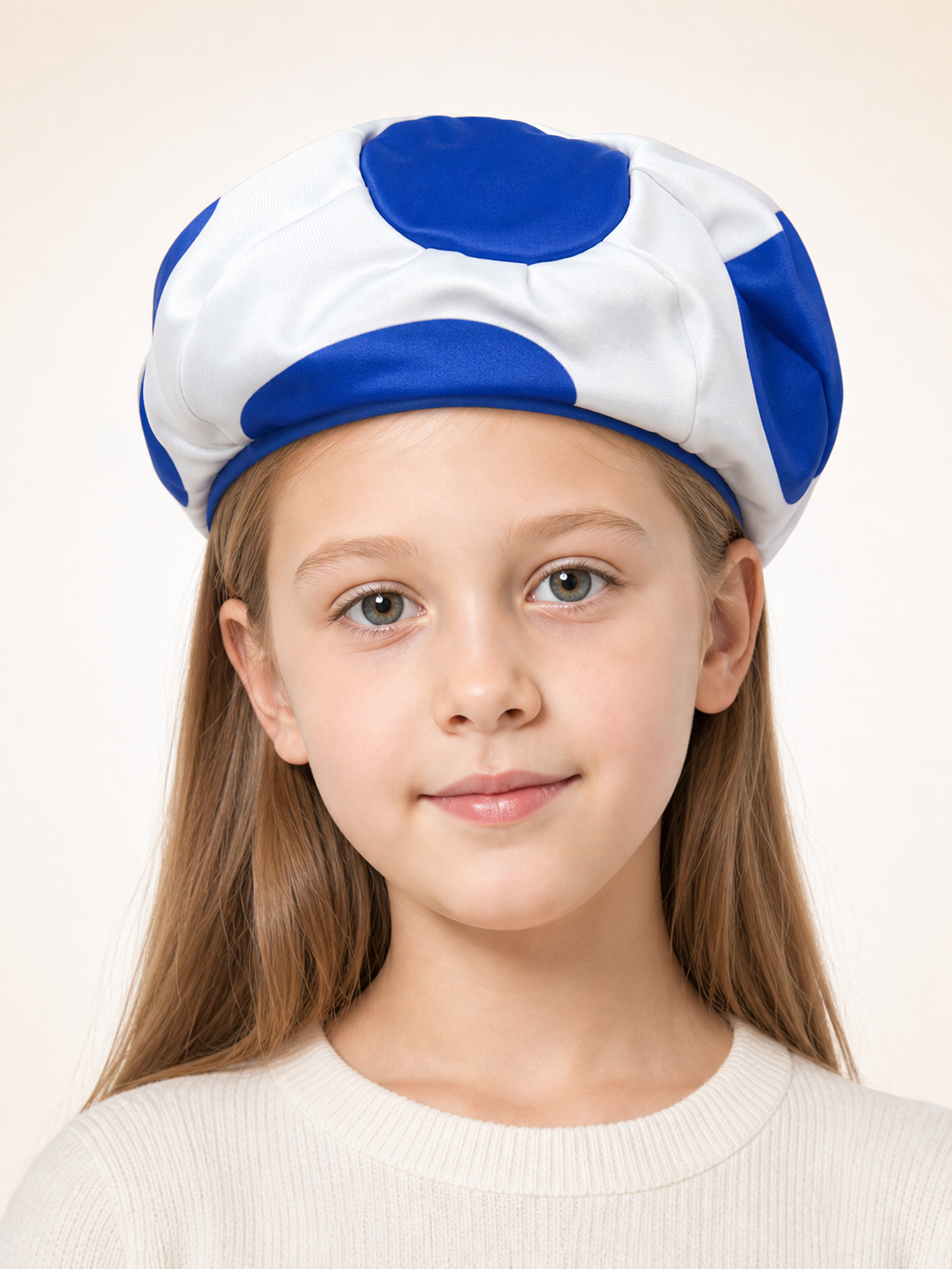 Round Blue and White Pillow with a Soccer Ball Design
