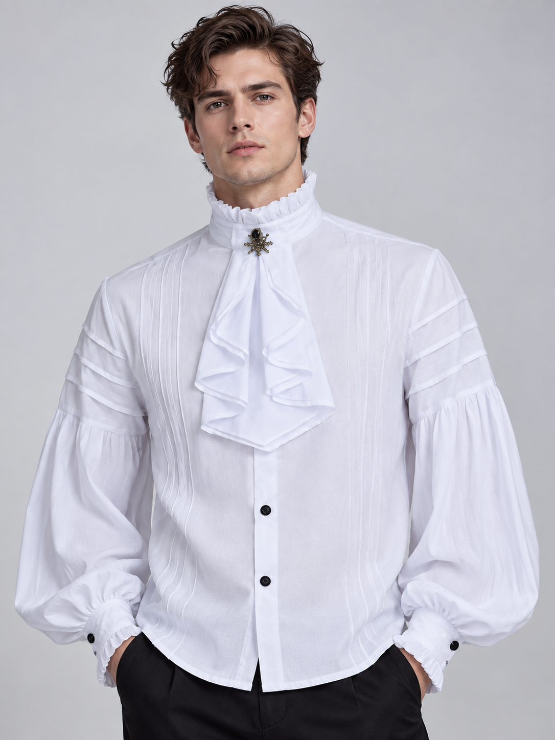 White shirt with a high collar, ruffles, and a brooch