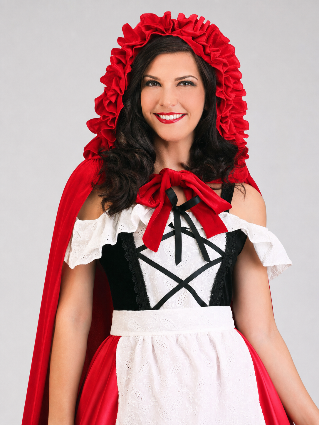 Red Riding Hood costume set designed as a dress with a cape, suitable for stage performances, festive dress-up, and themed cosplay. The set includes a costume combining a red dress with a full silhouette, a white apron-style front, and a re
