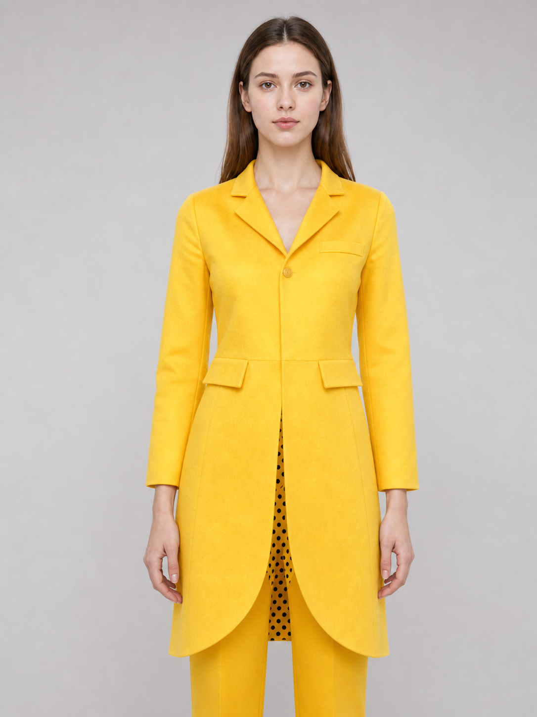 Costume with a Yellow Jacket and Hat