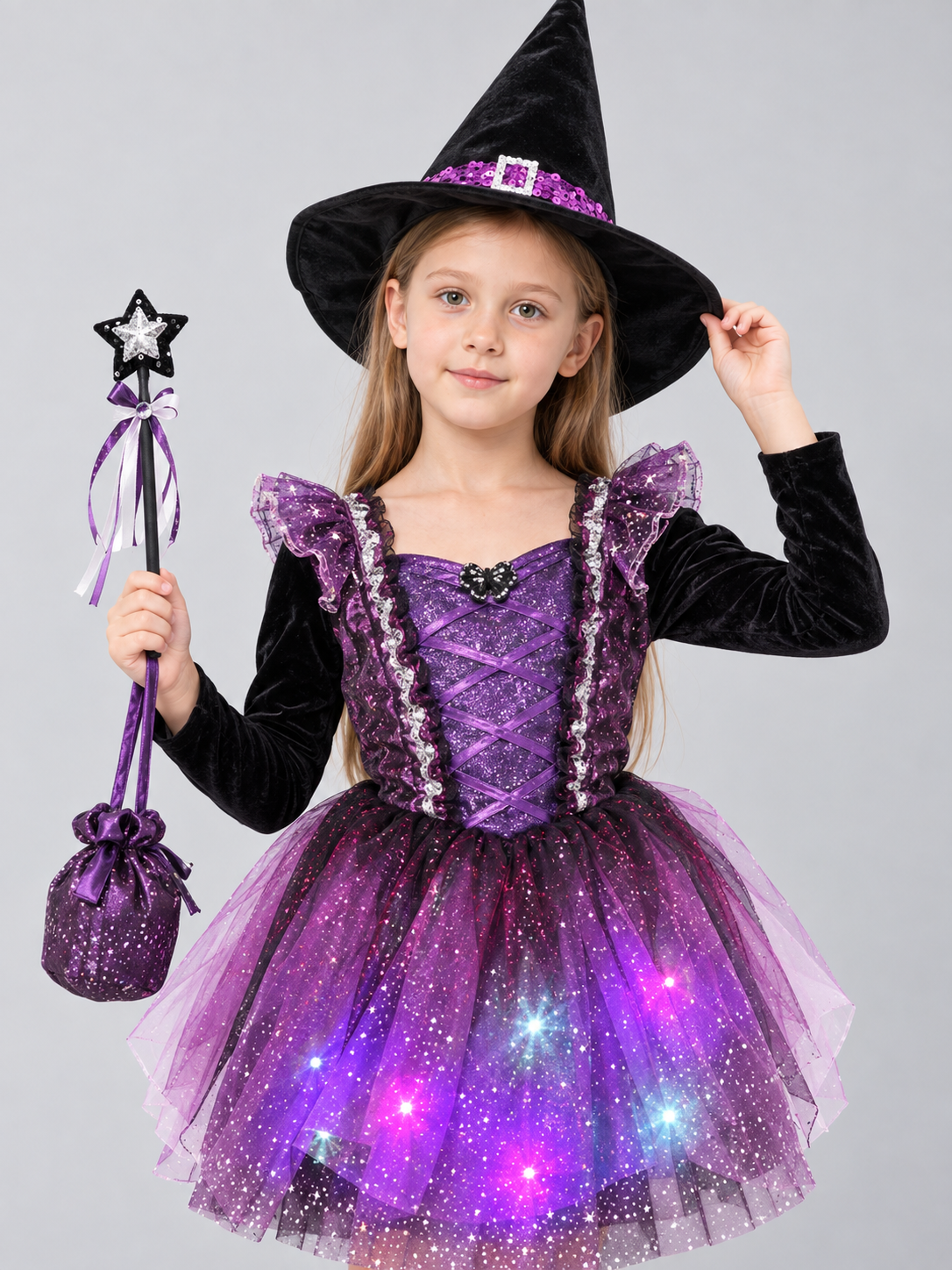 Kids' witch carnival costume with a glowing skirt