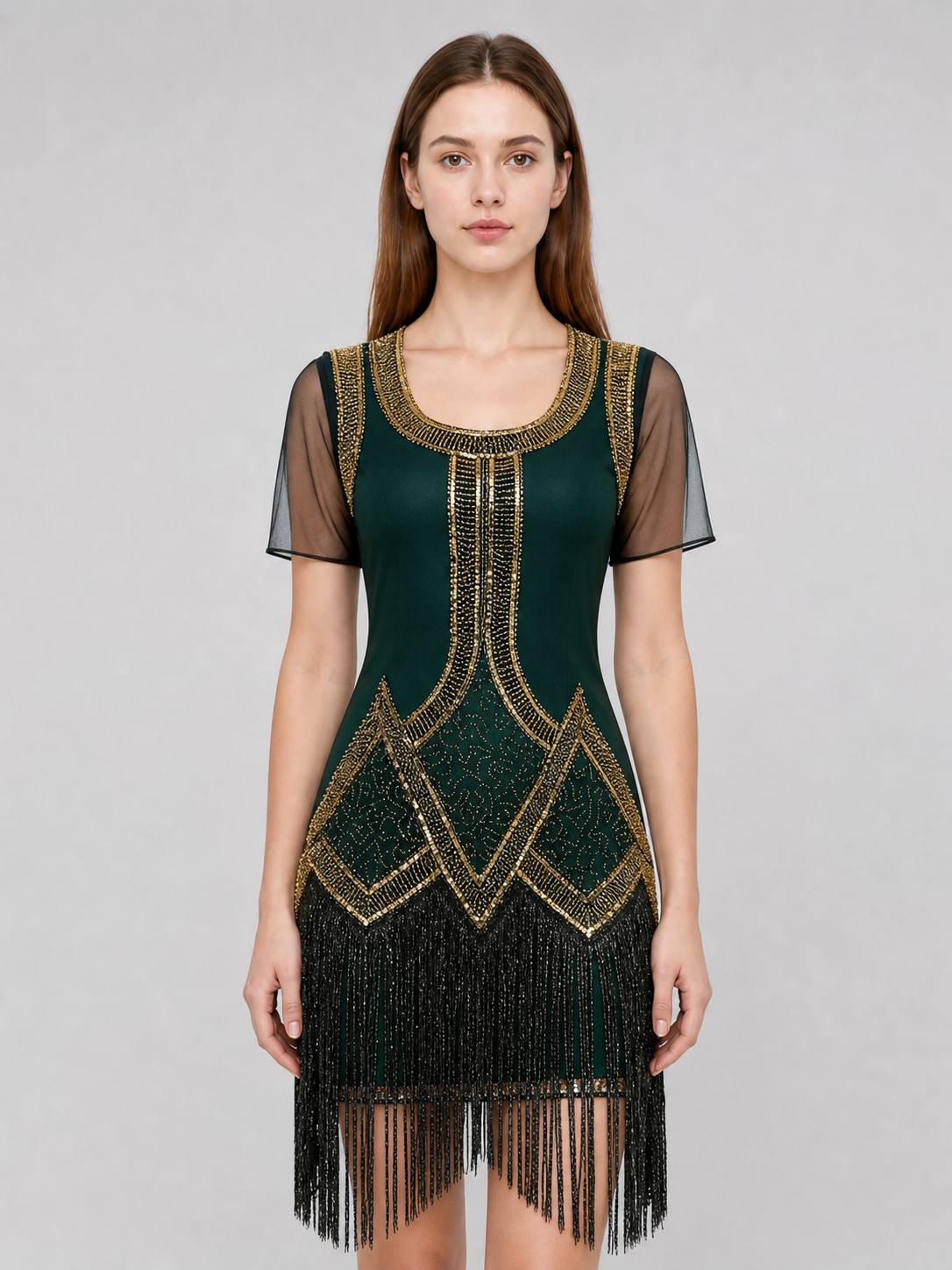 This fringed dress is designed in a vintage cocktail style, combining dark green