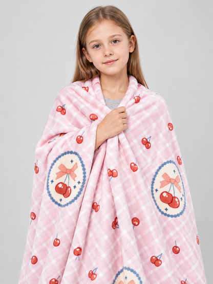 Pink reversible blanket with cherry and bow print, polyester