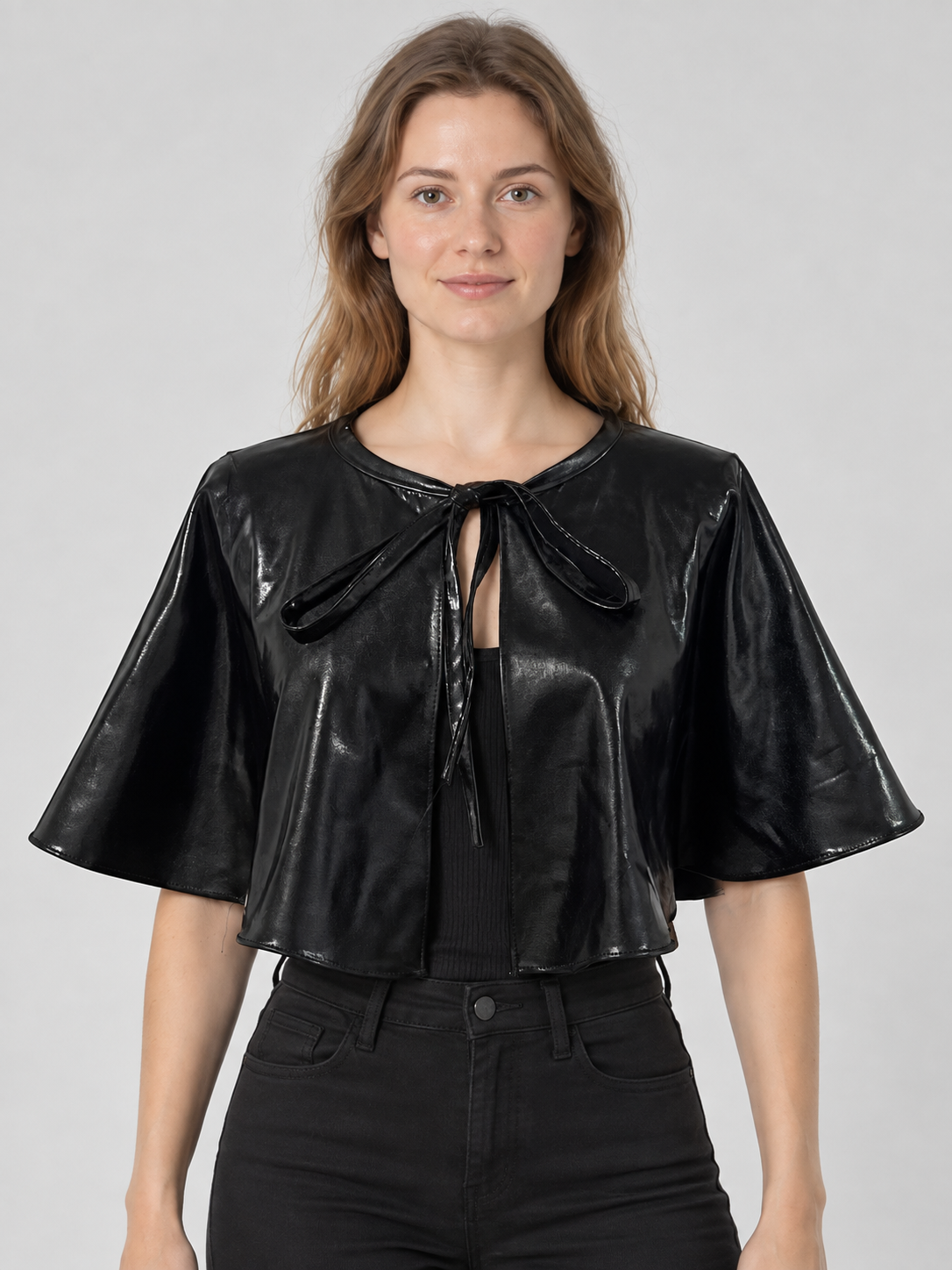 Short black shiny cape with ties
