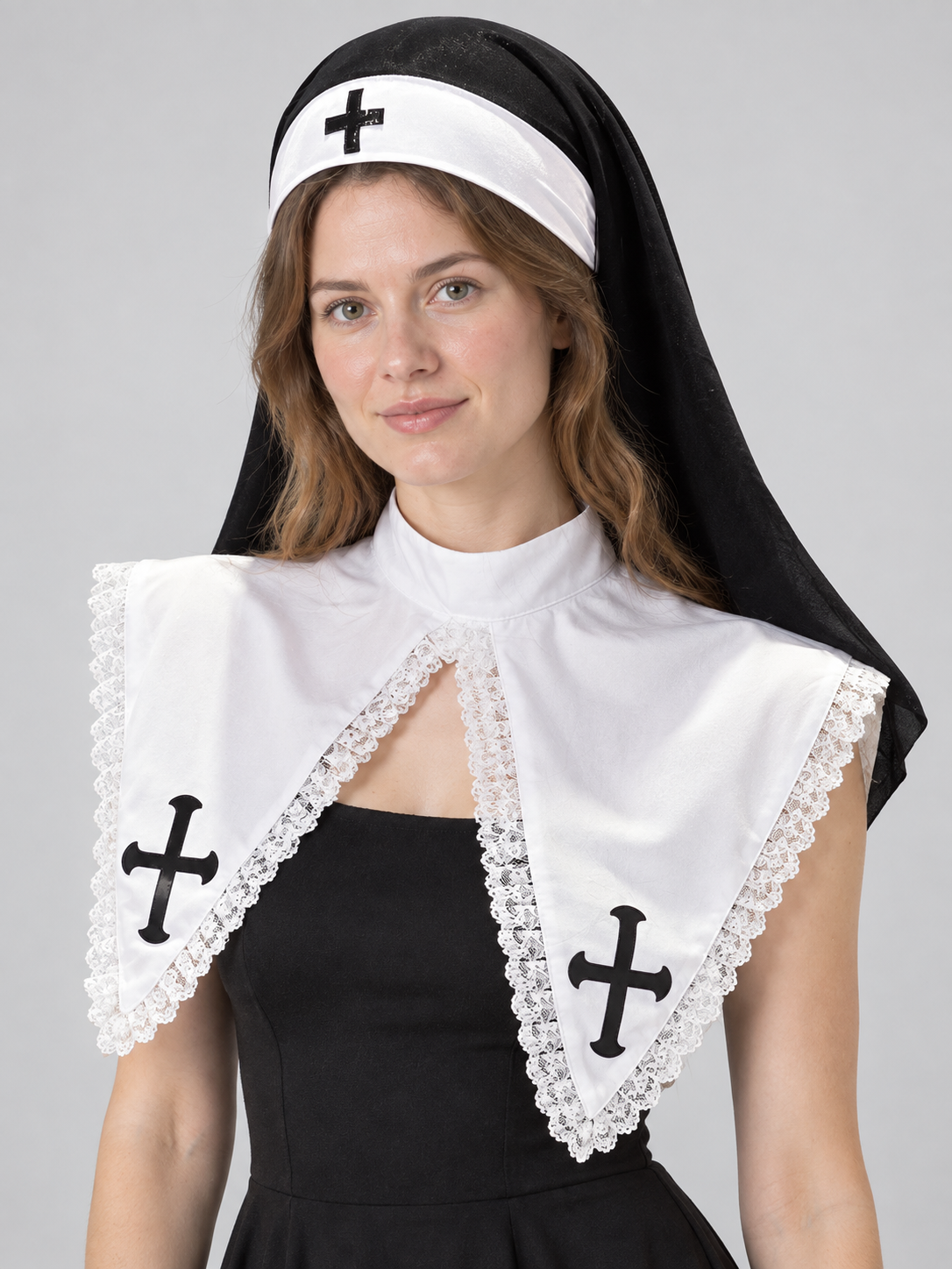 Black and white nun's headpiece with cross and veil