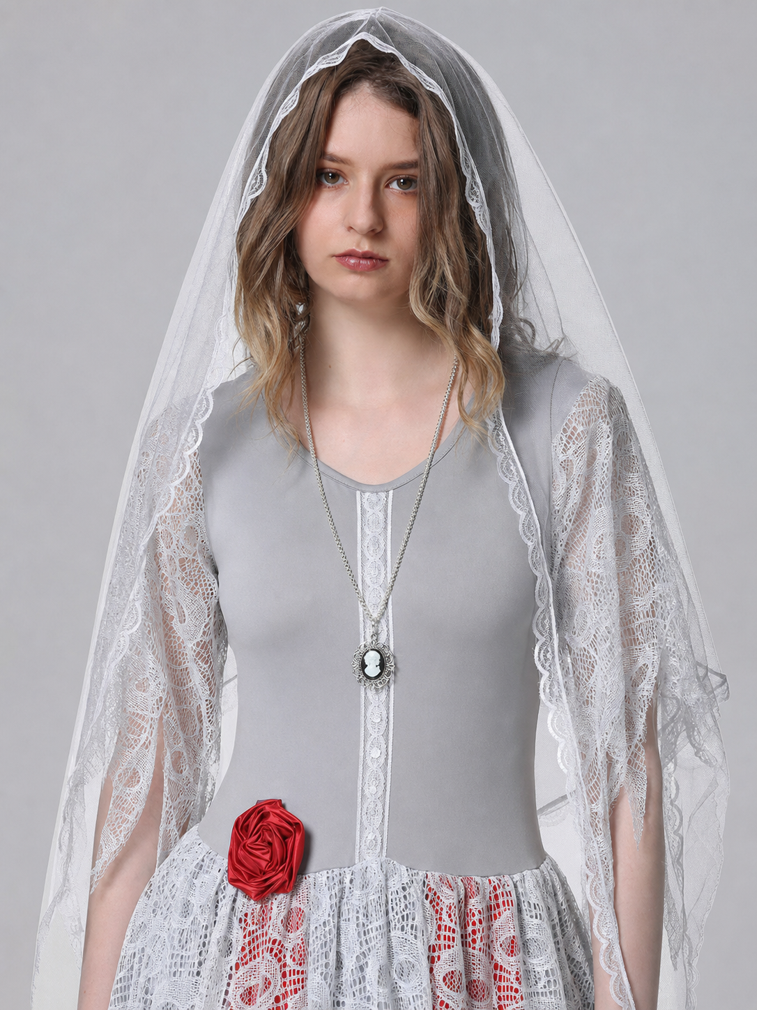 A retro court-inspired costume featuring a gray floor-length dress with white lace details and a veil. The design has a round neckline, long sleeves, a fitted bodice, and a flared skirt. White lace overlay appears on the sleeves and lower p