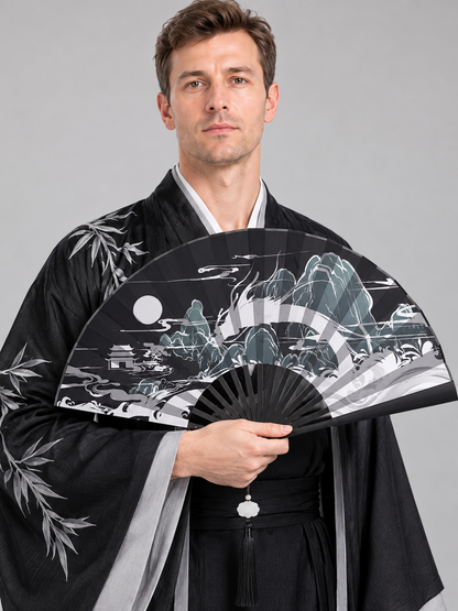 Folding fan with a landscape design and a tassel, black
