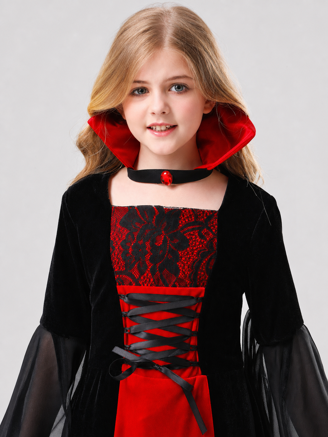 The vampire costume is designed in a black-and-red and gray-and-black color scheme and features a long garment with a silhouette reminiscent of a vampire cloak. The design includes a red hood, long sleeves, and semi-transparent gray-and-bla