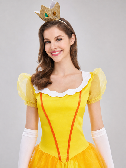 The princess costume features a festive style with distinctive details. The look is centered around a yellow dress with a fitted bodice and full skirt. Symmetrical orange decorative lines on the chest accent the bodice design. A white colla