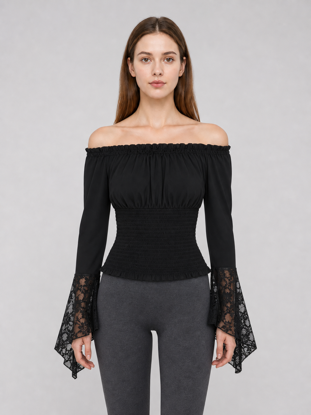 Black off-the-shoulder blouse with ruffles and long sleeves