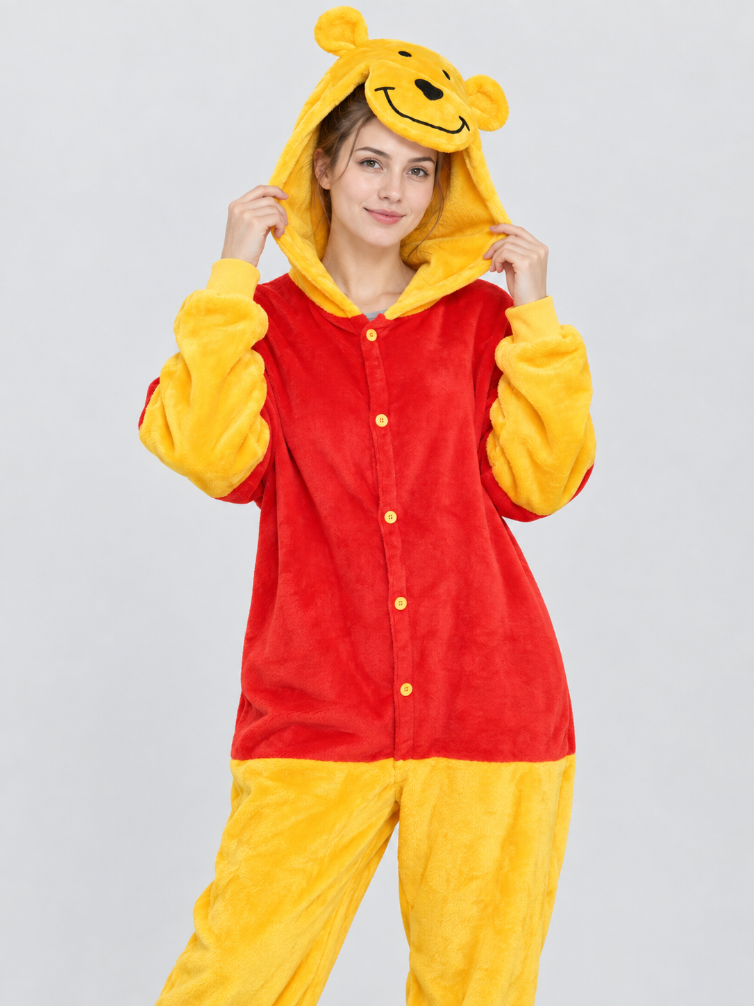 Red and yellow pajama jumpsuit with bear ears