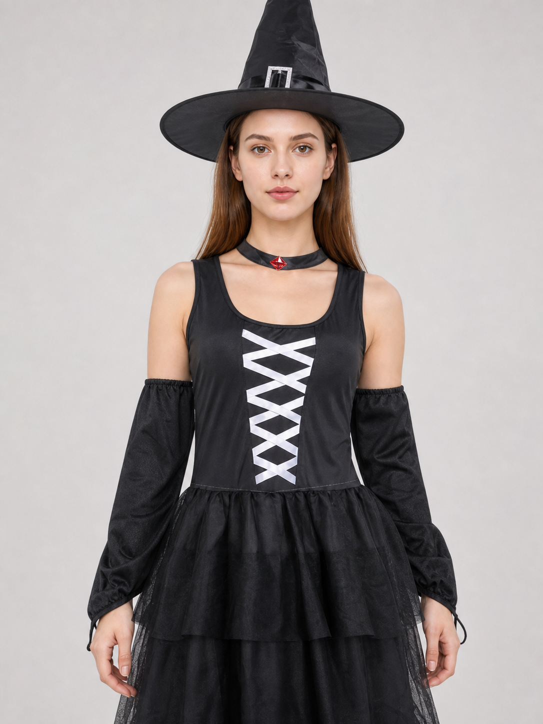 The set includes a black sleeveless dress, a pointed witch hat, separate Costume Dresses detail