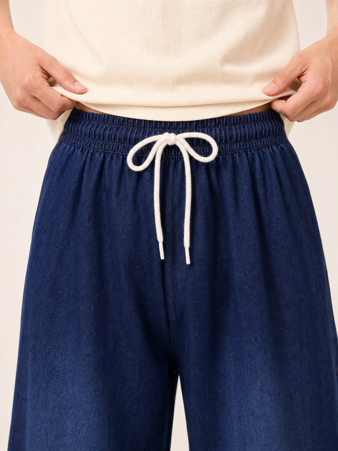 Wide-leg dark navy pants with drawstring
