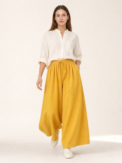 Mustard-colored wide-leg pants with long pant legs